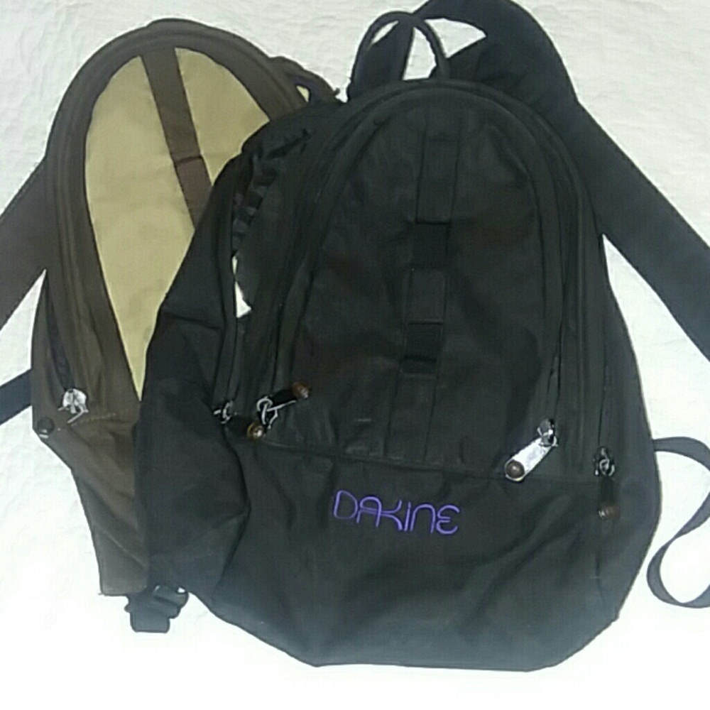 Black and brown Dakine mini backpacks